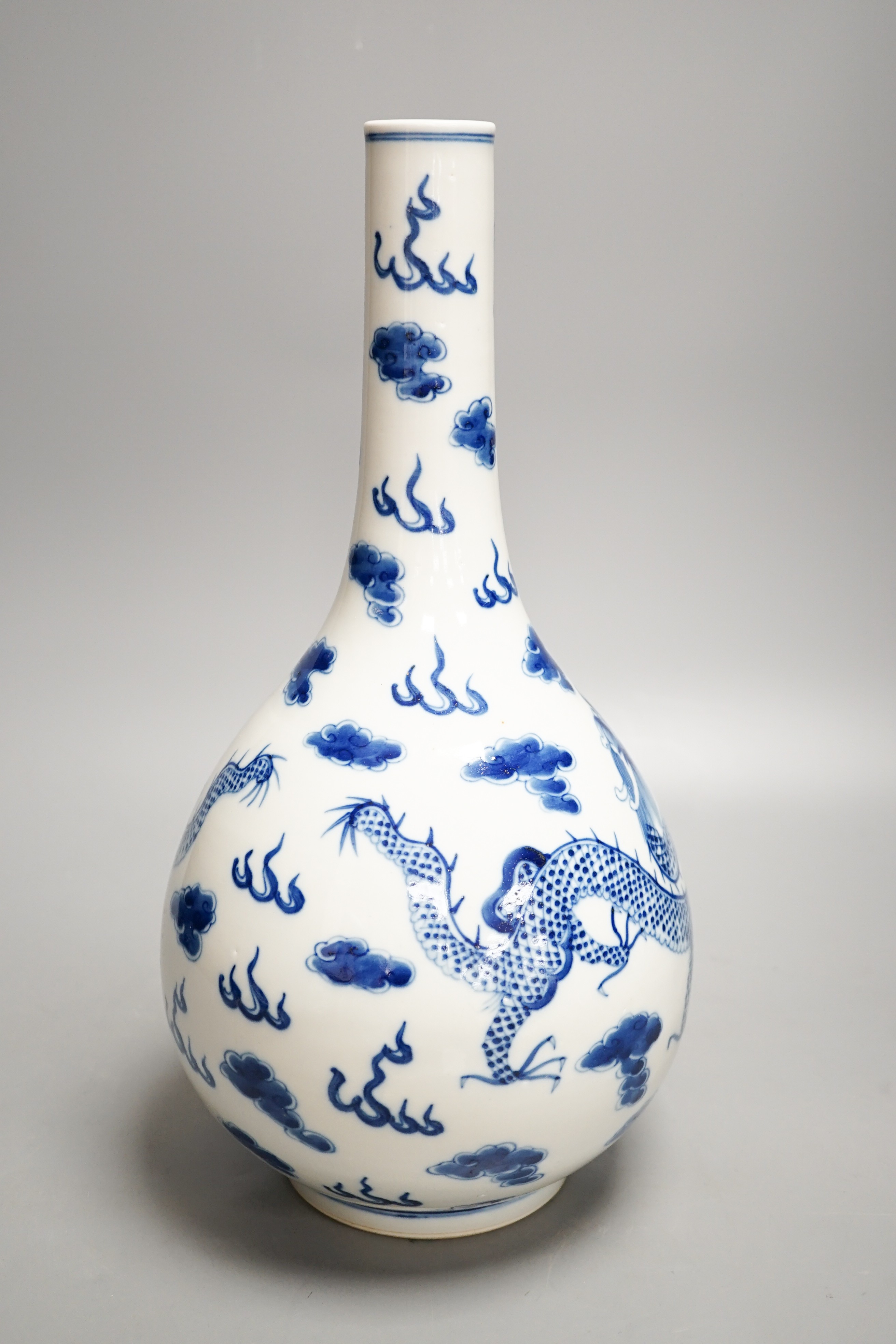 A Chinese blue and white ‘dragon’ bottle vase 36cm